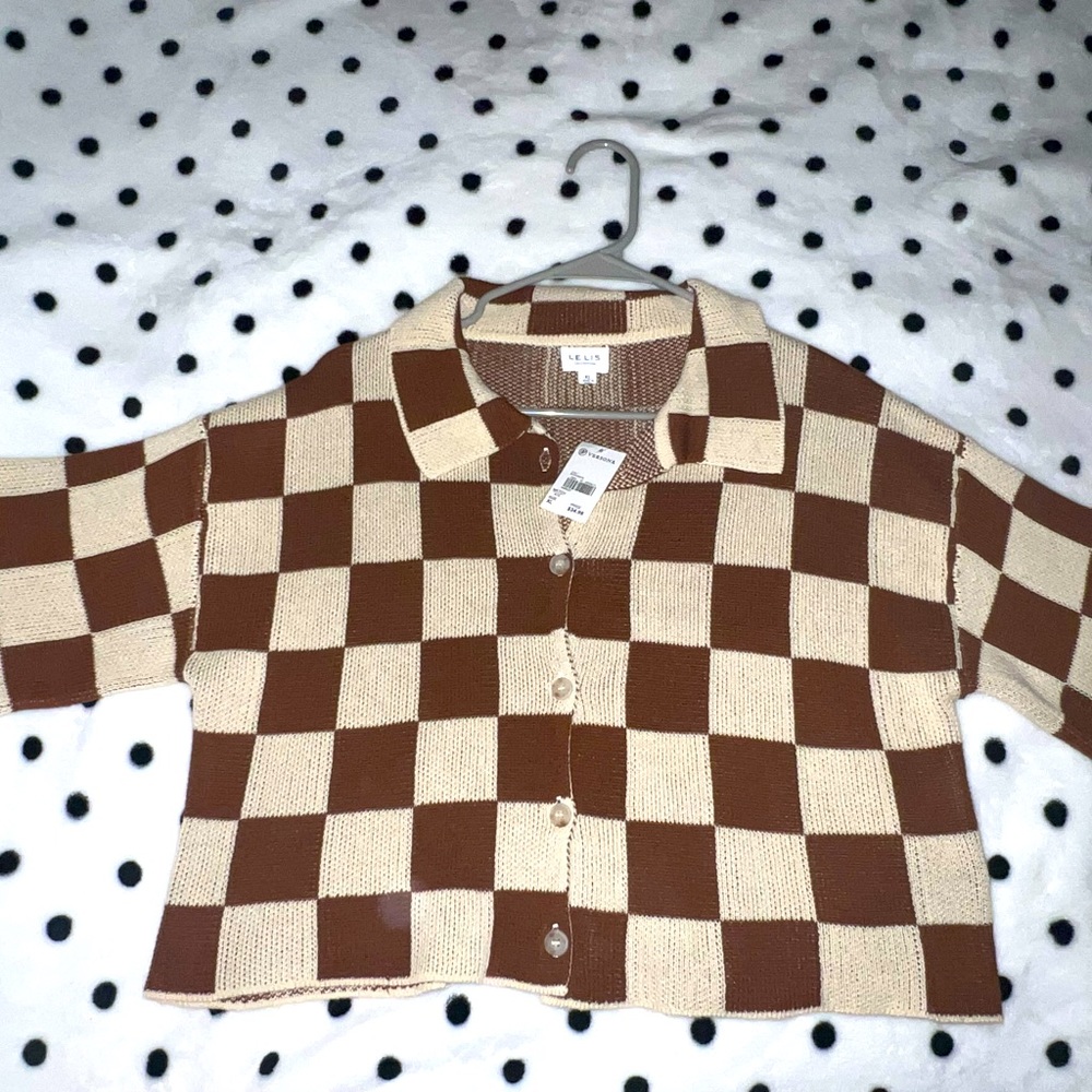 70s style checkered shirt.